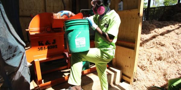 One of SOIL's team members rocking protective equipment to keep dust out of his eyes while hard at work with our new bonzodè grinder