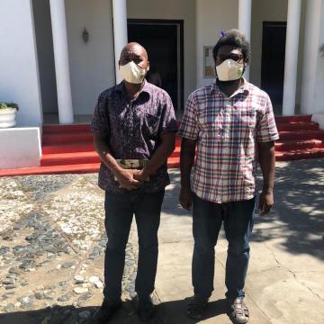 Director General of City Hall, Carry Hyppolite, alongside SOIL's Senior Manager, Romel Toussaint