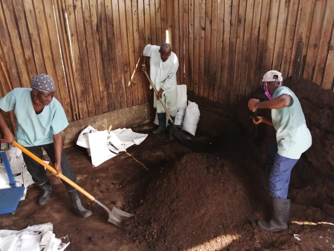 SOIL’s compost team working at compost site