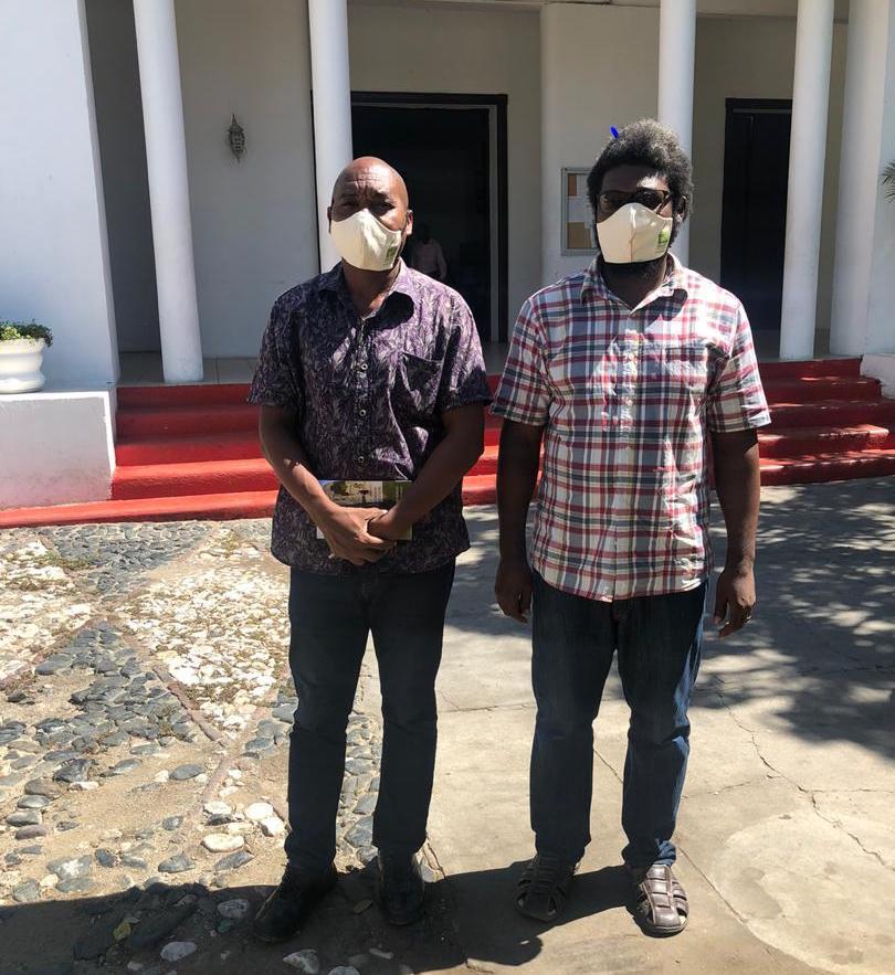 Director General of City Hall, Carry Hyppolite, alongside SOIL's Senior Manager, Romel Toussaint