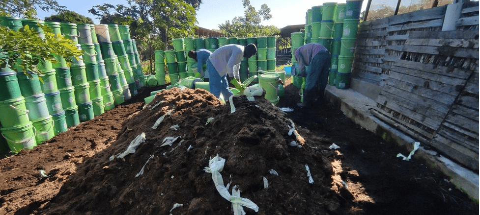 SOIL’s Research Team experimenting with compostable container liners