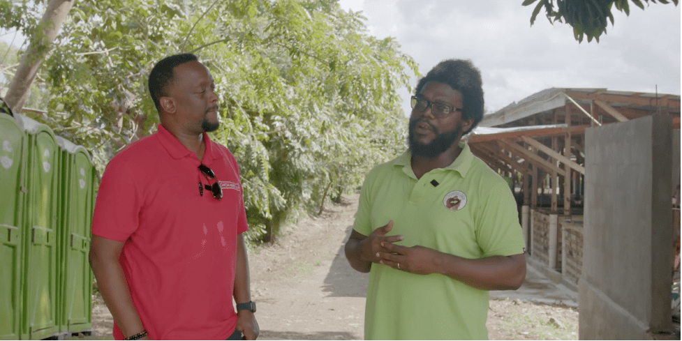 Carel Pedre speaking with SOIL’s Senior Manager, Romel Toussaint
